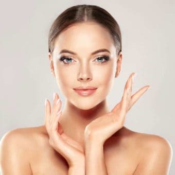 Smiling Female Posing With Hands