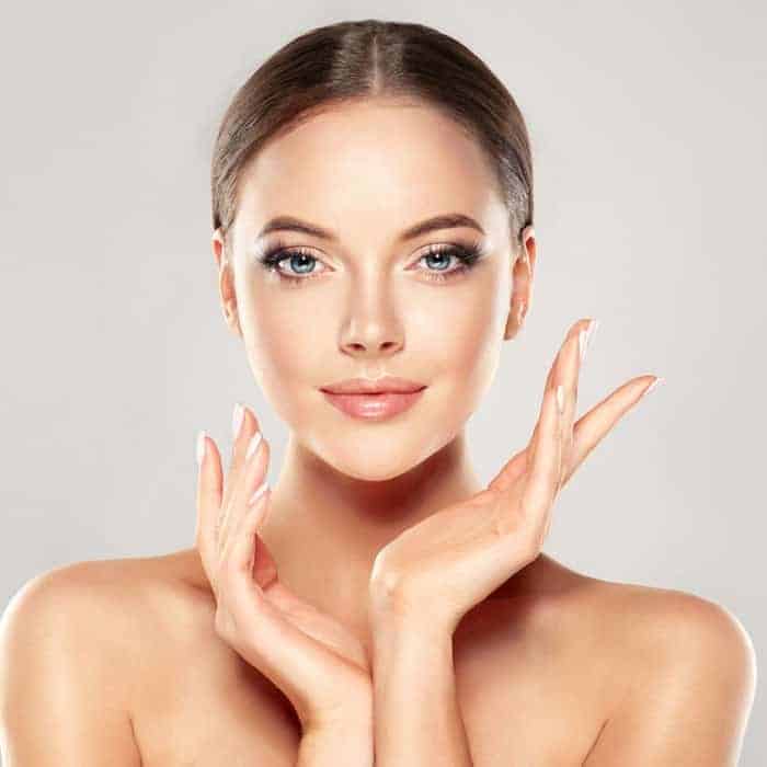 Smiling Female Posing With Hands
